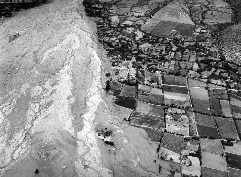 Aerial view of the destruction of farmland in mountain valleys by ice and mud avalanches