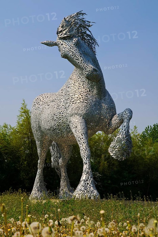Metal Sculpture of a Gypsy Cob Horse on a Carousel