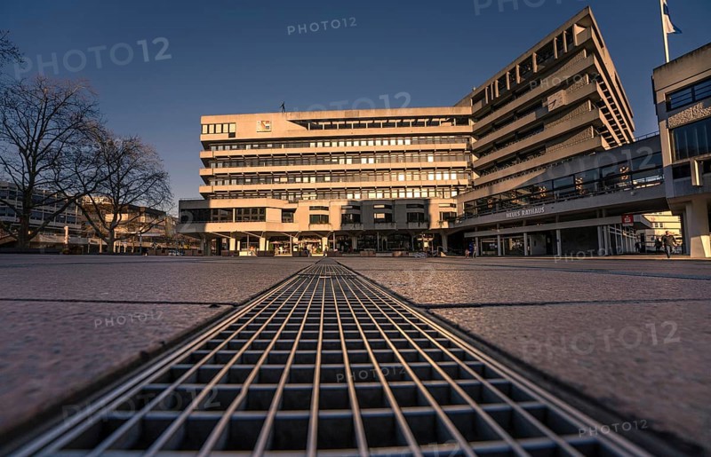 View over ground grids of the historic town hall in the evening light