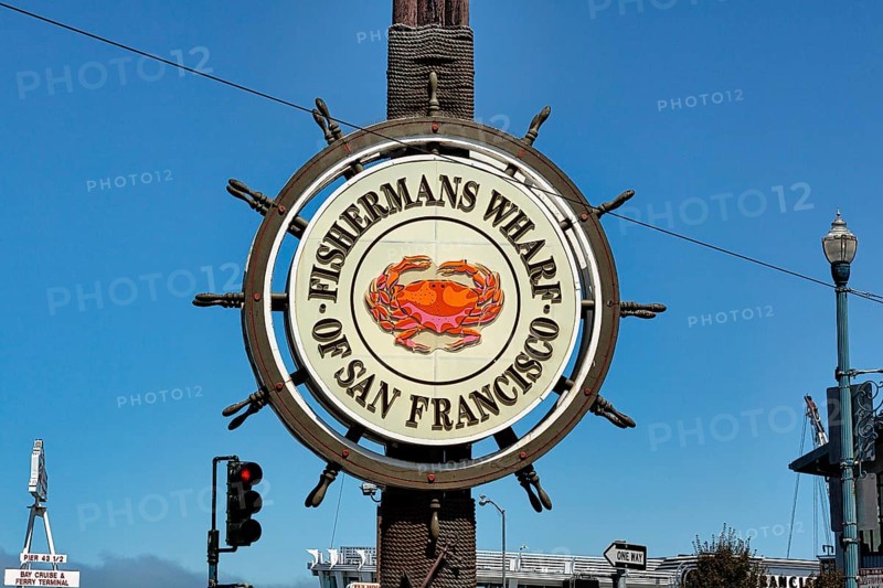 Fisherman's Wharf logo with crab symbol