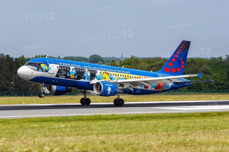 An Airbus A320 aircraft of Brussels Airlines with registration number OO-SND and the Smurfs special livery at Brussels Airport