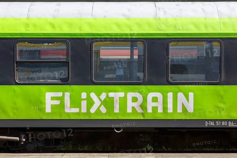 Flixtrain logo on a train at the main station in Stuttgart