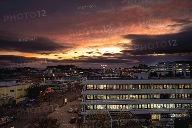Epic sunrise in the industrial estate with illuminated buildings