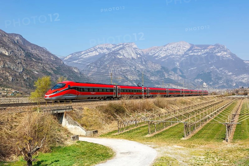 Frecciarossa FS ETR 1000 high-speed train of Trenitalia on the Brenner line near Avio