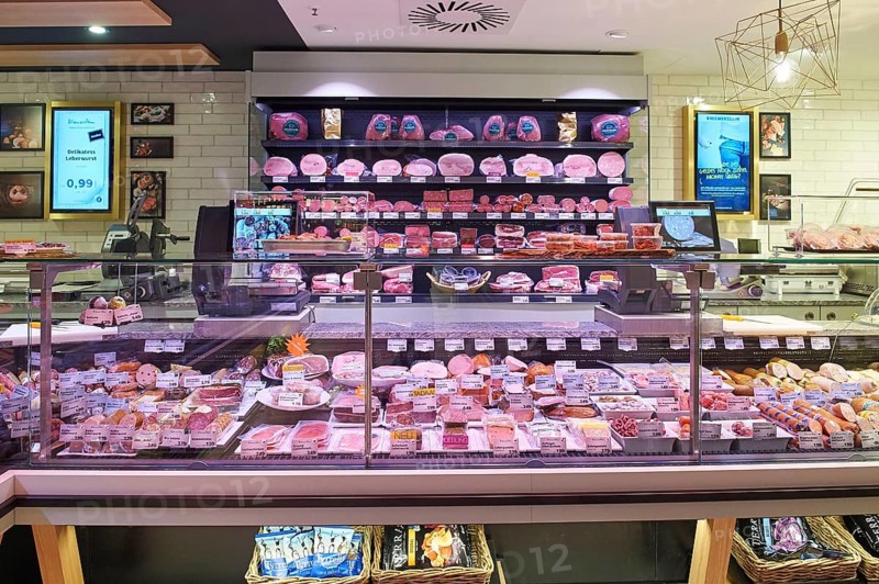 Service counter for meat and sausage products. Edeka Niemerszein