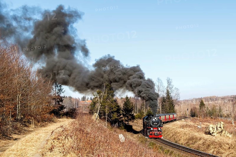 Steam train of the Brockenbahn railway leaving Drei Annen Hohne