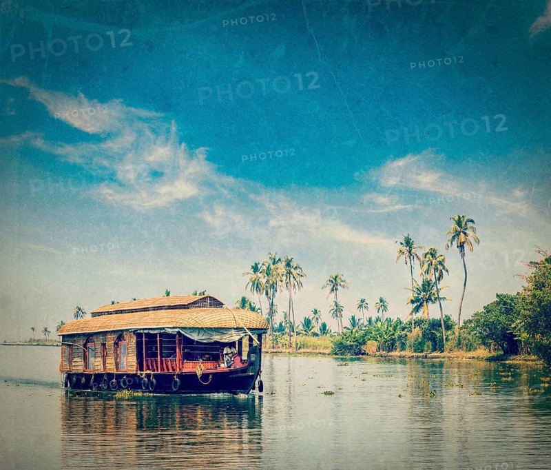 Vintage retro hipster style travel image of travel tourism Kerala background