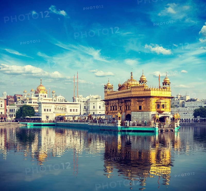 Vintage retro effect filtered hipster style travel image of Sikh gurdwara Golden Temple
