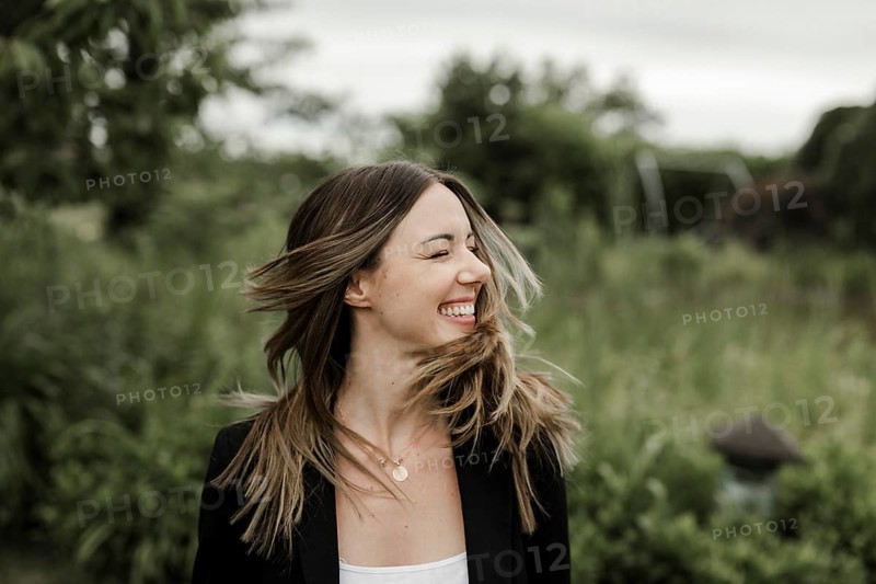 Laughing young woman in portrait