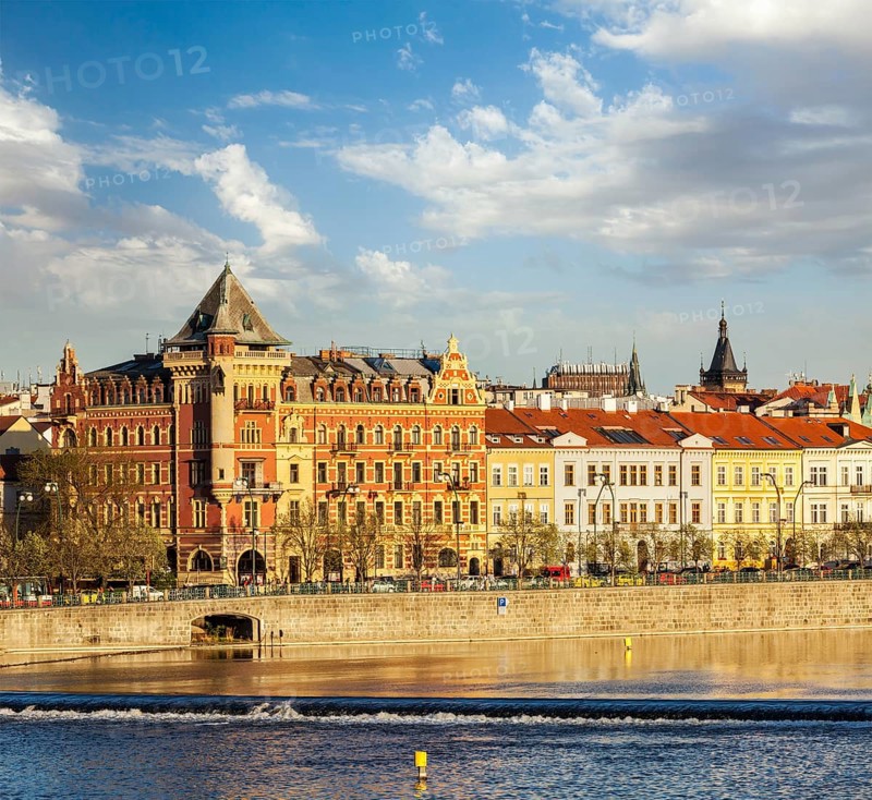 Prague Stare Mesto embankment view from Charles bridge on sunset. Prague