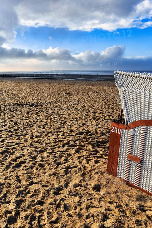 Beach chair on an empty sandy beach