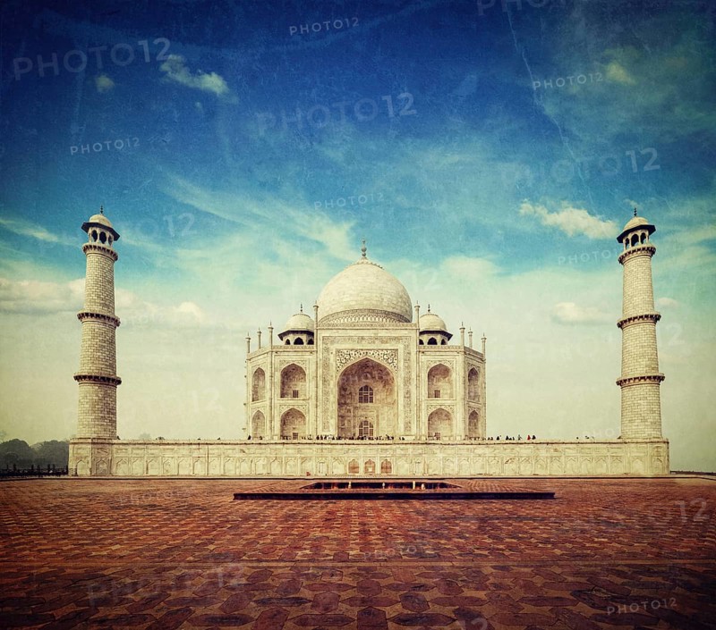 Vintage retro hipster style travel image of Taj Mahal. Indian Symbol