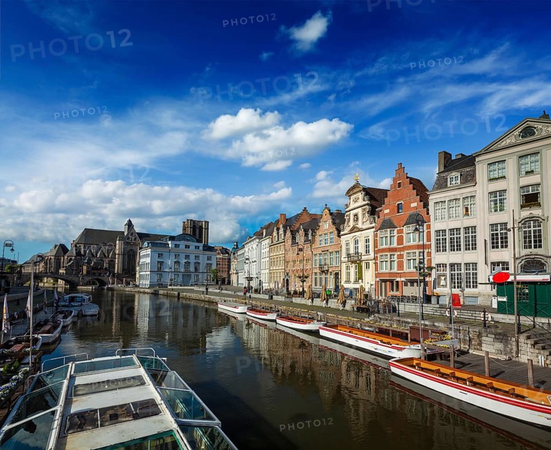 Travel Belgium medieval european city town background with canal. Koperlei street