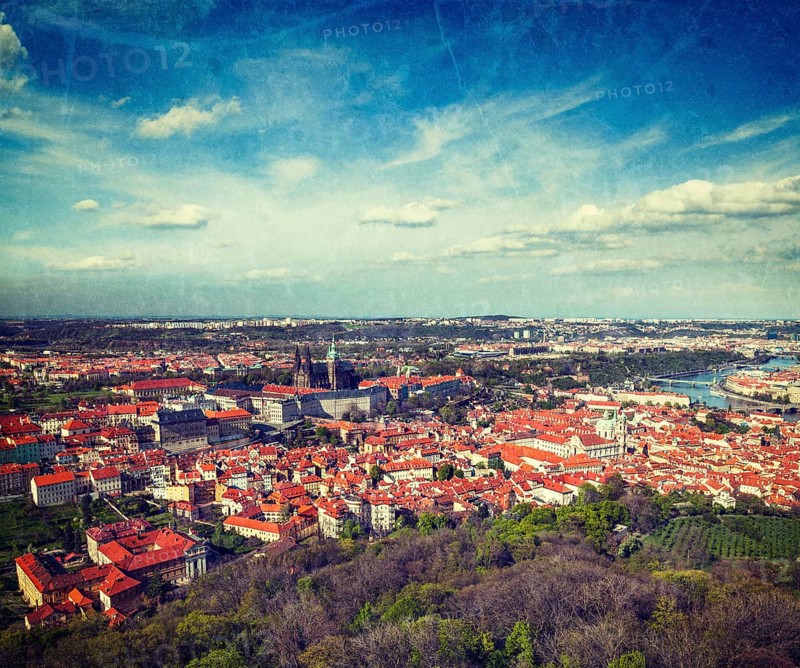 Vintage retro hipster style travel image of aerial view of Hradchany part of Prague: the Saint Vitus