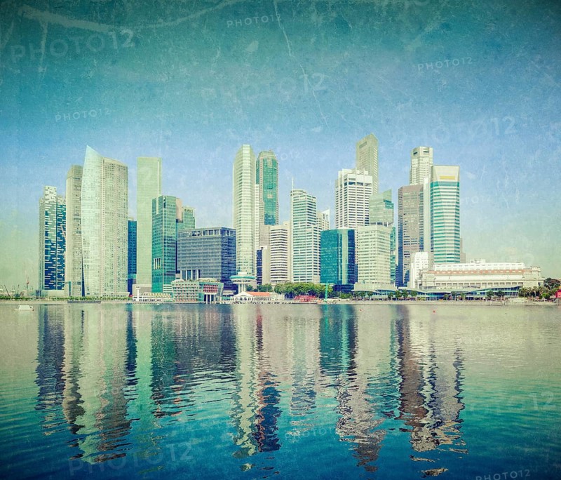 Modern city skyline of business district downtown of Singapore in day with grunge texture overlaid