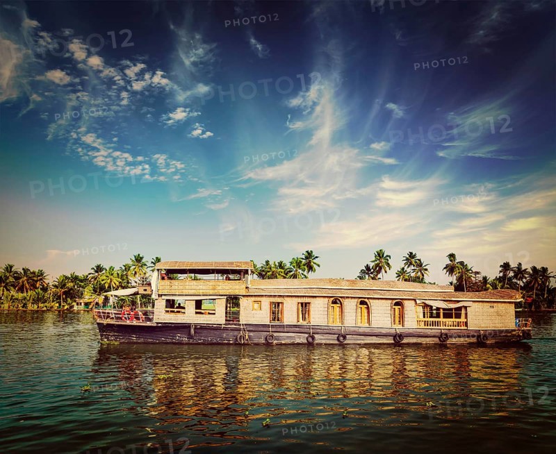 Vintage retro hipster style travel image of travel tourism Kerala background