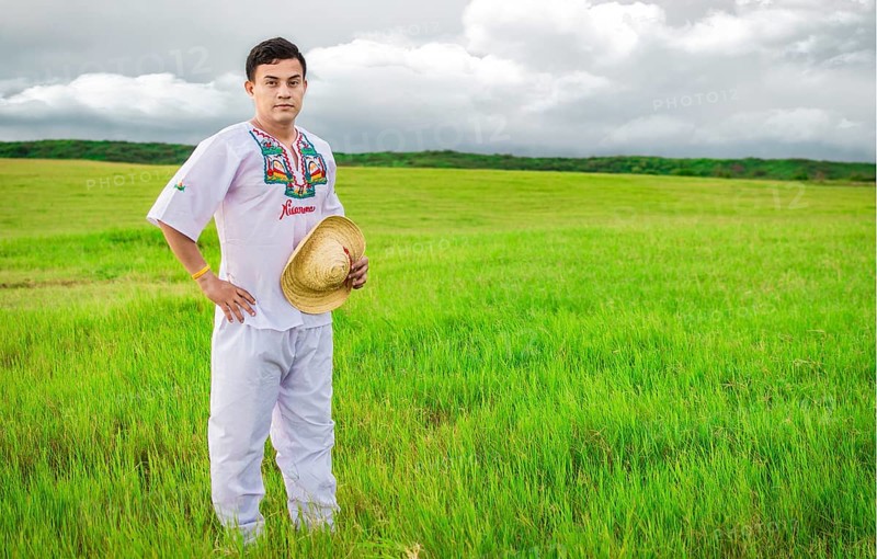 Man wearing Central American folk costume