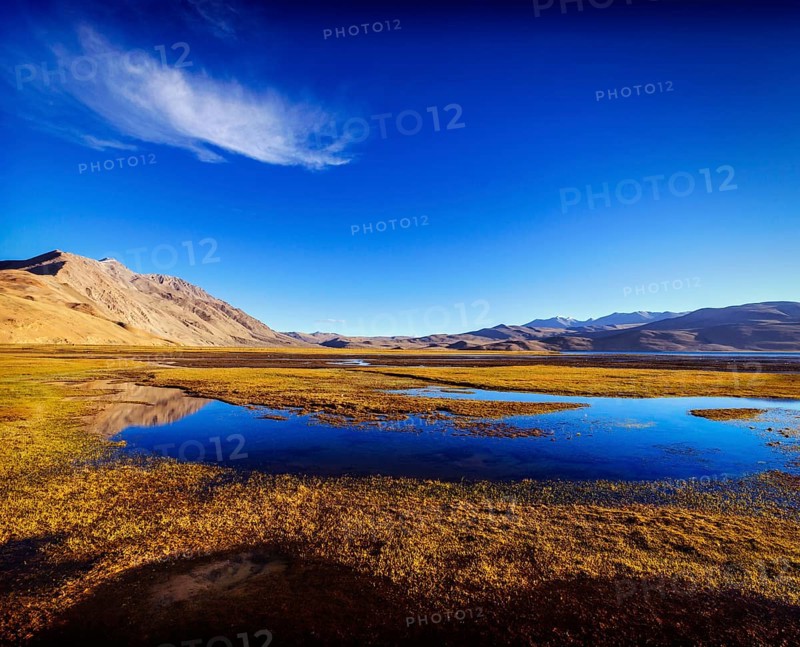 Vintage retro effect filtered hipster style travel image of Tso Moriri lake in Himalayas