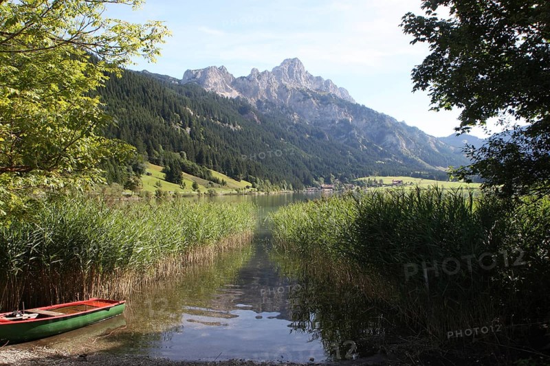 Haldensee with view of Gimpel and Rote Flueh in the Tannheim Valley