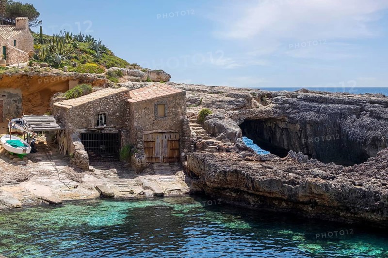 Fishermen's huts in Cala de s'Almonia
