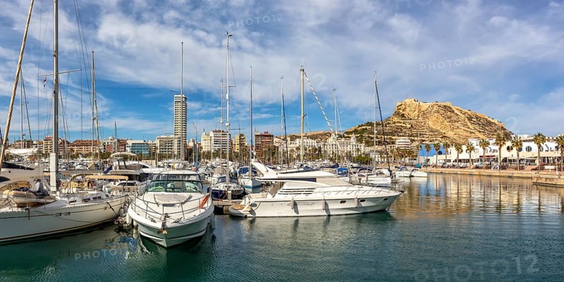 Alicante Port dAlacant Marina with boats and view of Castillo Castle holiday travel city panorama in Alicante