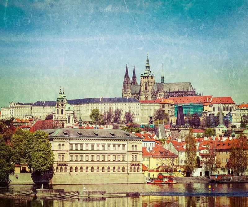 Vintage retro hipster style travel image of Charles bridge over Vltava river and Gradchany