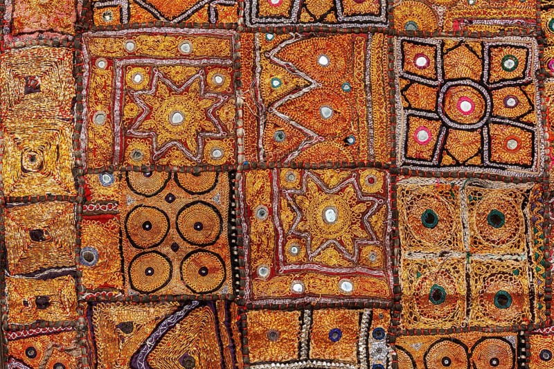 Colorful indian fabric textile texture background. India