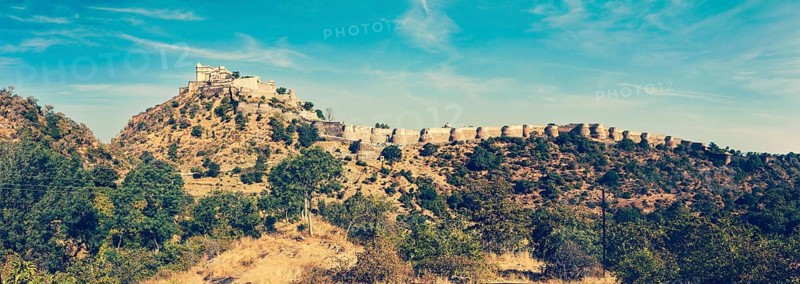 Vintage retro hipster style travel image of panorama of Kumbhalgrh fort. Rajasthan