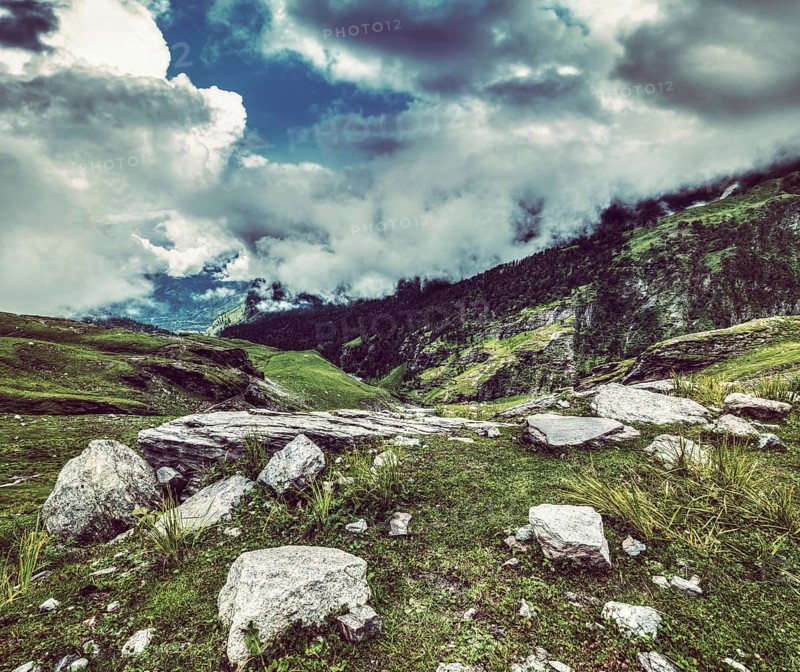 Vintage retro effect filtered hipster style travel image of mountain landscape in Himalayas. Kullu valley