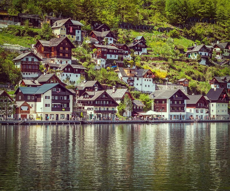 Vintage retro effect filtered hipster style travel image of Austrian tourist destination Hallstatt village on Hallstatter See in Austrian alps. Salzkammergut region