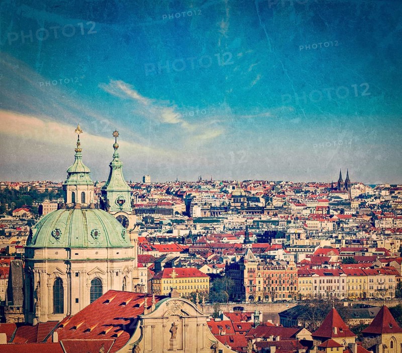 Vintage retro hipster style travel image of aerial view of Prague from Prague Castle. Prague