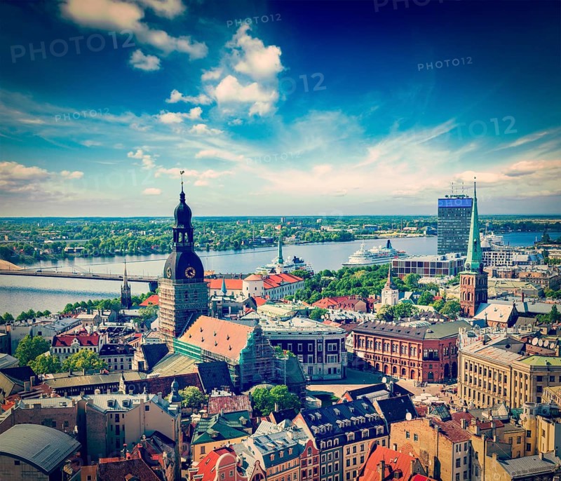 Vintage retro hipster style travel image of aerial view of Riga center from St. Peter's Church