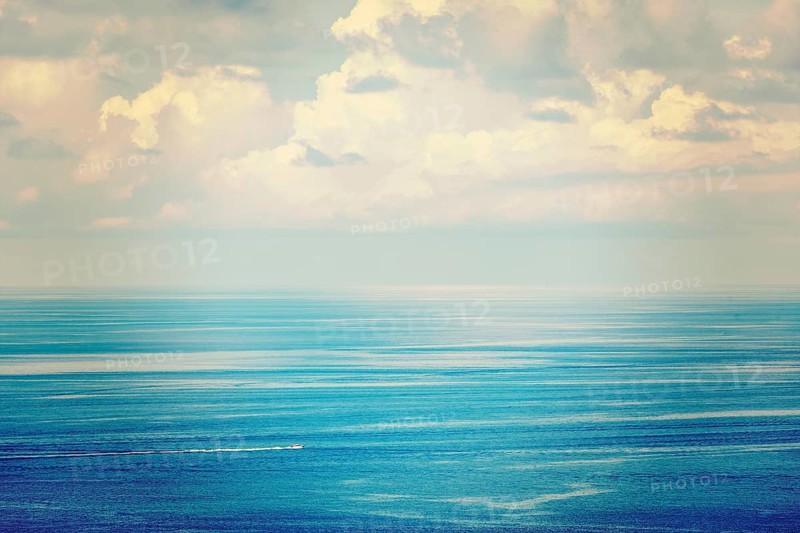 Vintage retro effect filtered hipster style travel image of speeding boat in blue sea. Andaman Sea
