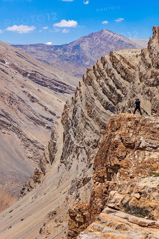 Photographer taking photos in Himalayas mountains. Spiti valley