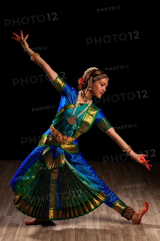 Young beautiful woman dancer exponent of Indian classical dance Bharatanatyam