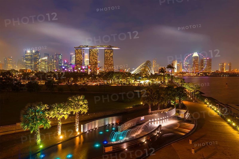 Tracel background of Singapore skyline illumintaed in the evening twilight