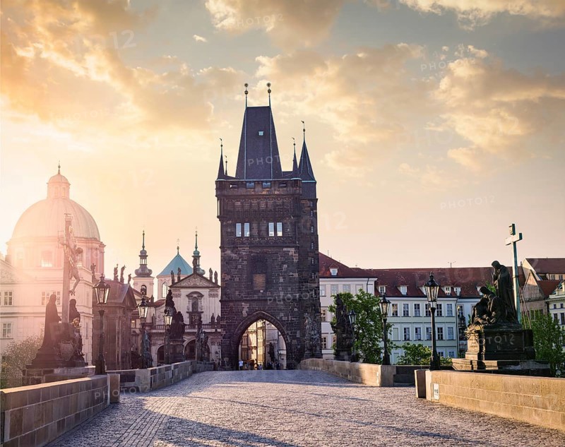 Charles bridge tower in Prague on sunrise