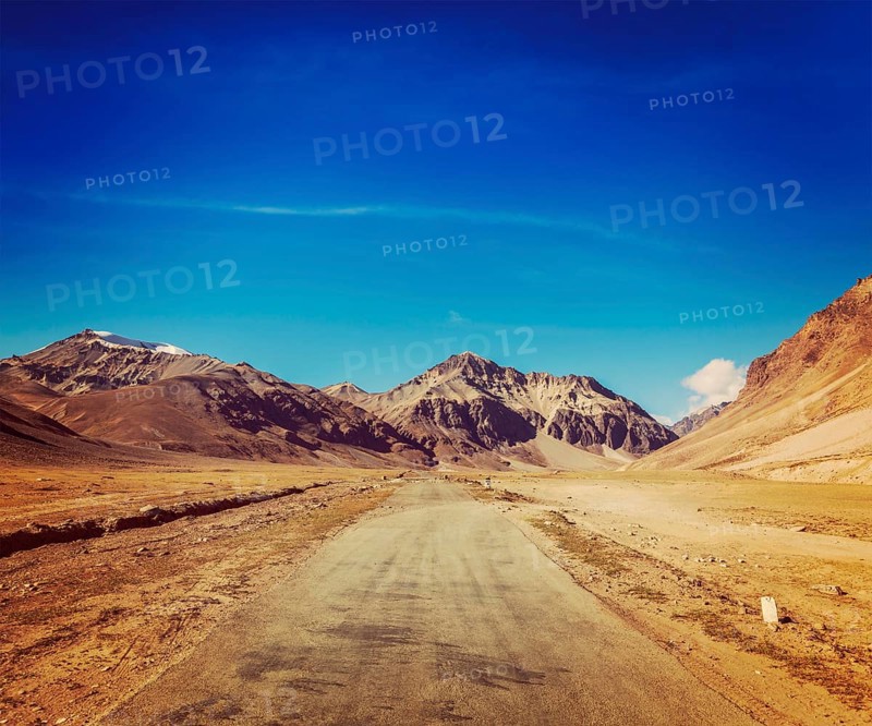 Vintage retro effect filtered hipster style travel image of Manali-Leh road to Ladakh in Indian Himalayas near Sarchu. Ladakh