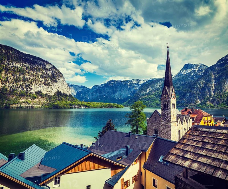 Vintage retro effect filtered hipster style travel image of Austrian tourist destination Hallstatt village on Hallstatter See in Austrian alps. Salzkammergut region