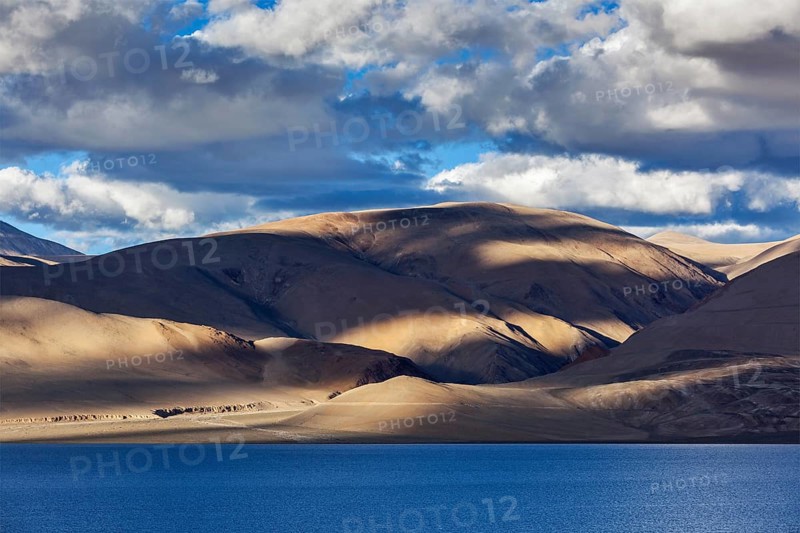 Himalayan mountain lake in Himalayas Tso Moriri on sunset