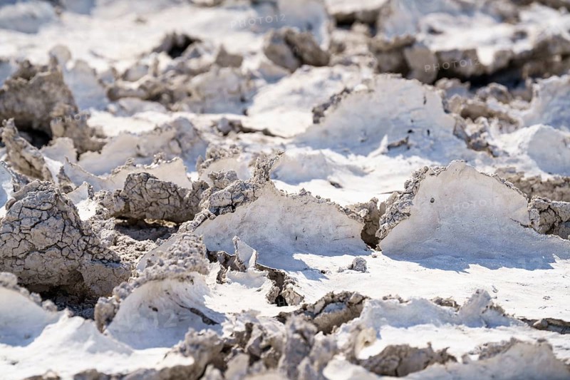Drought mud patterns with cracks on the ground
