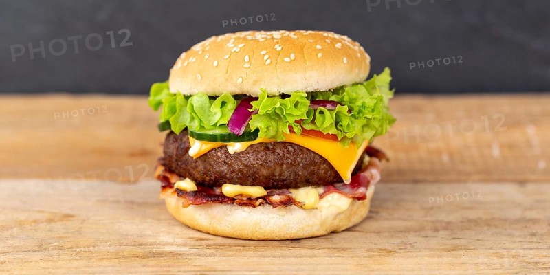 Hamburger Cheeseburger Fast Food Food on Wooden Board Panorama in Stuttgart