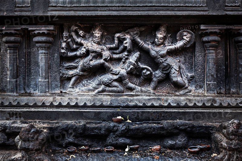 Bas relief depicting Durga slaying demon