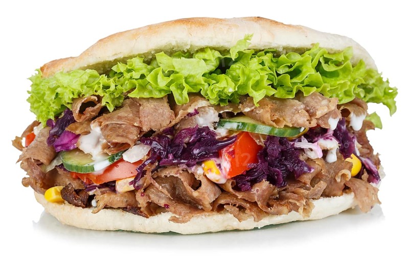 Doener Kebab Doner Kebap fast food in a flatbread cut out against a white background in Stuttgart