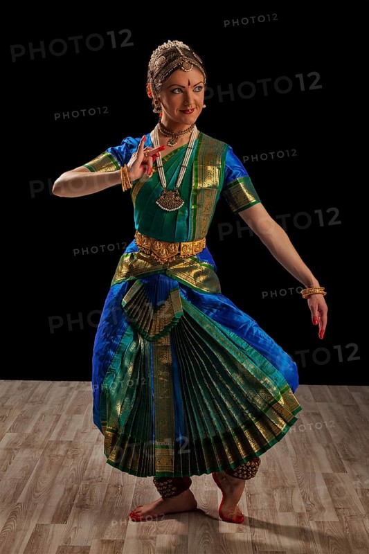 Young beautiful woman dancer exponent of Indian classical dance Bharatanatyam