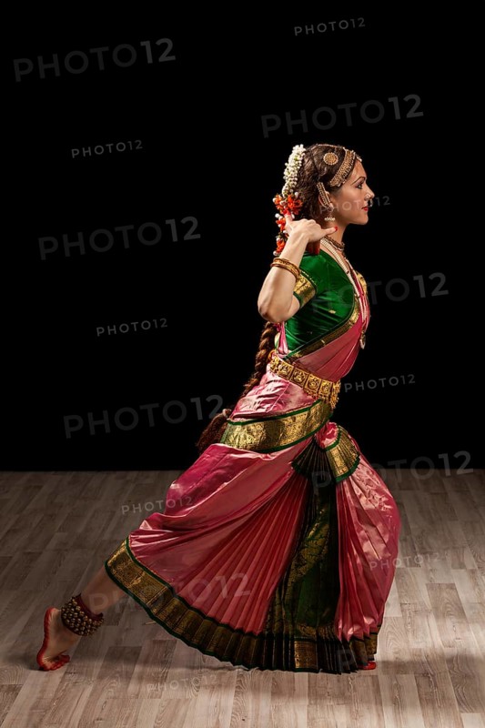 Young beautiful woman dancer exponent of Indian classical dance Bharatanatyam