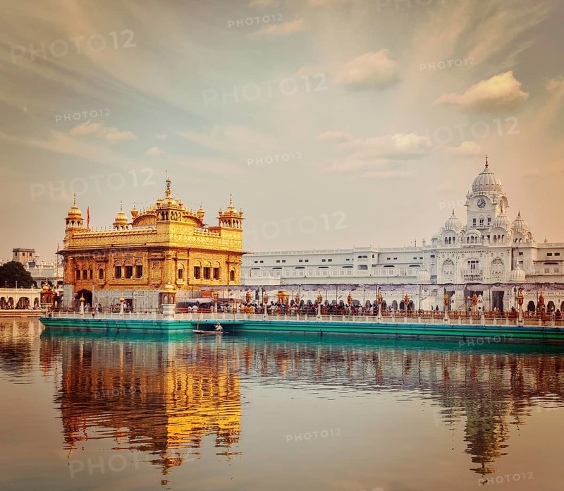 Vintage retro effect filtered hipster style travel image of Sikh gurdwara Golden Temple Harmandir Sahib. Amritsar