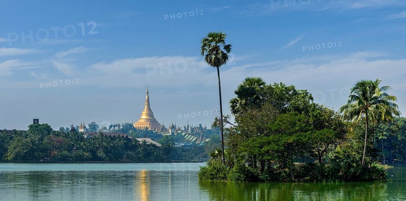 Panorama of Shwedagon Pagoda over Kandawgyi Lake in Yangon