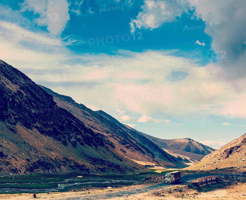 Vintage retro effect filtered hipster style travel image of Indian lorry on Manali-Leh Road. Ladakh