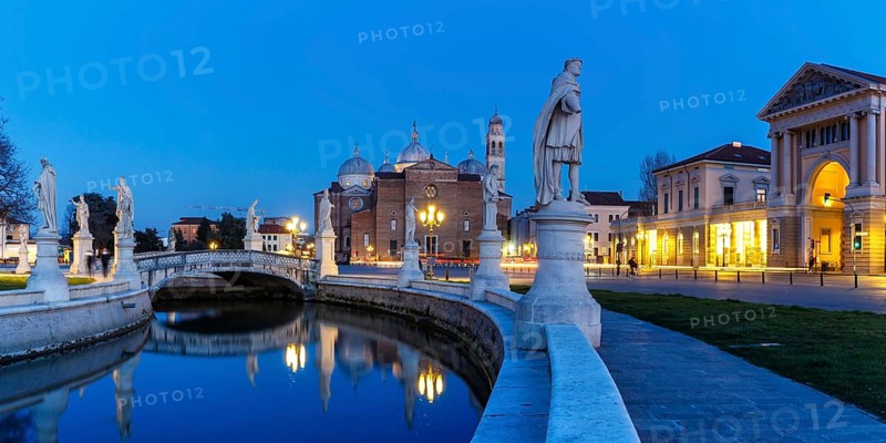 Prato Della Valle square with statues travel city panorama at night in Padua